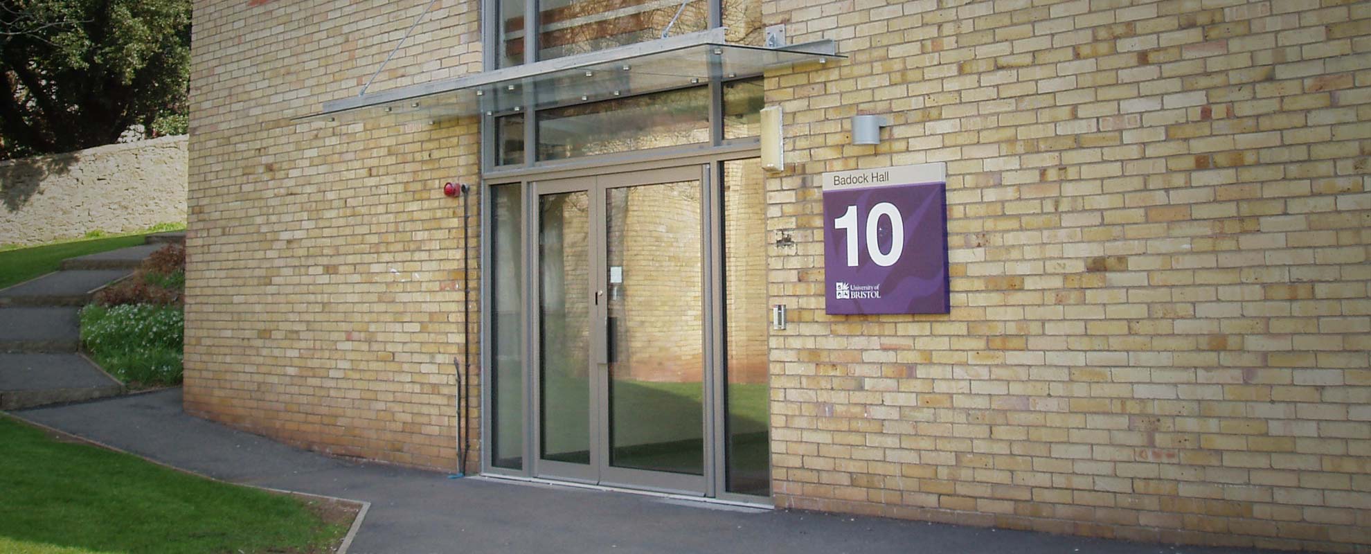 Commercial entrance leading up to a multi storey apartment block