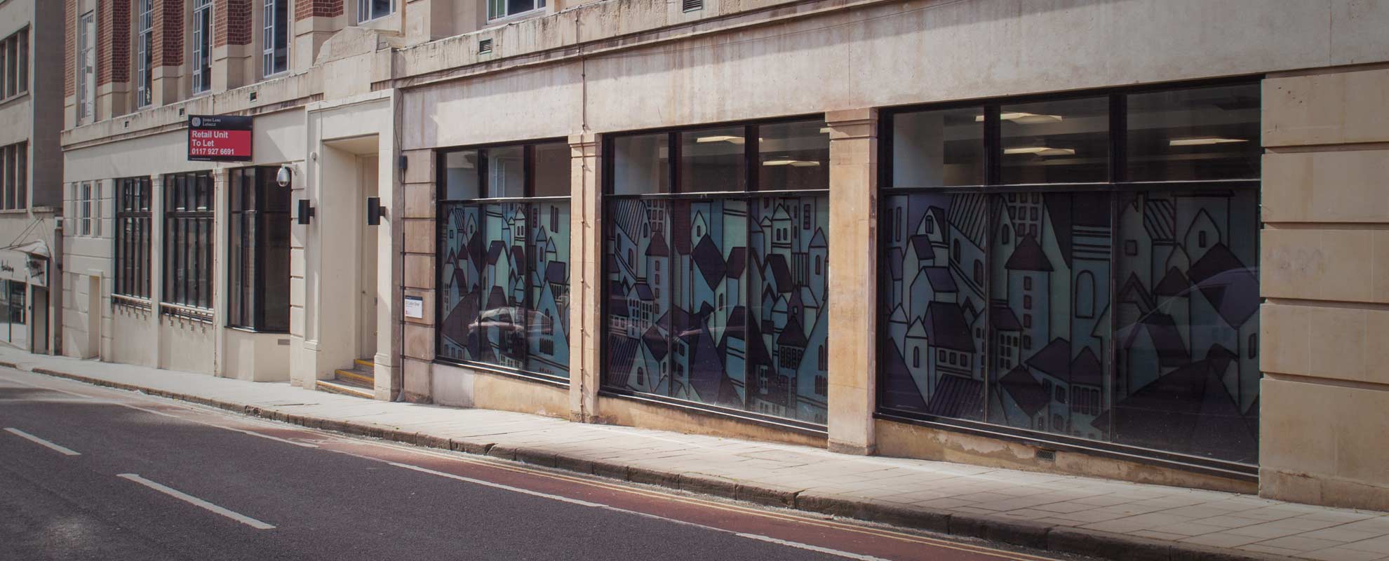 Black aluminium window wall for retail space in Colston Street, Bristol